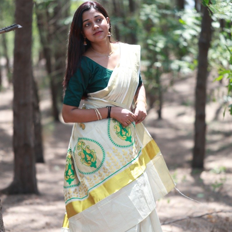 Floral Design Kerala Embroidery Tissue Saree from Kuthampully