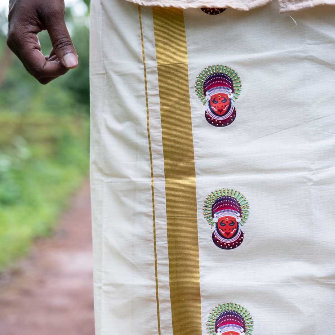 Golden Zari Kerala Cream Dhoti with Theyyam Stone Work
